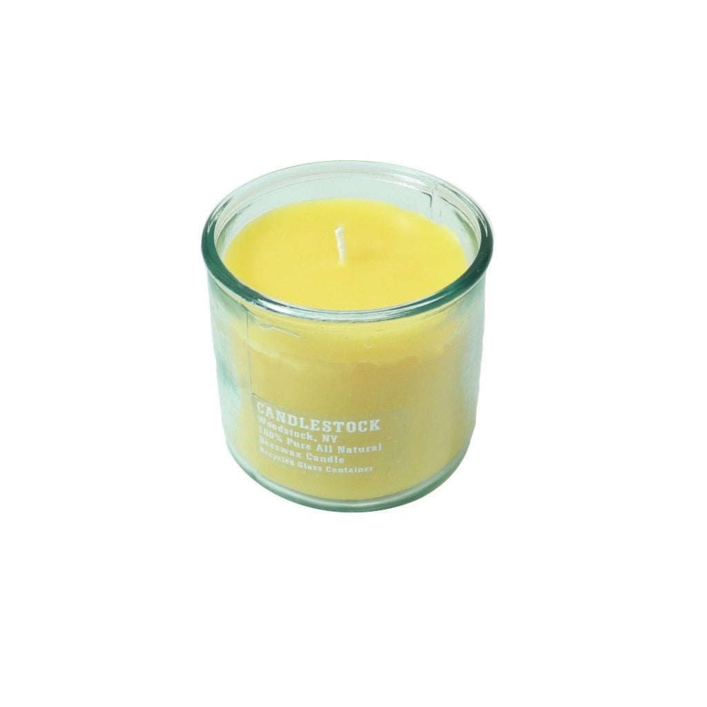 Woodstock candle made with 100% pure all natural beeswax and an eco friendly recycled glass jar. - Candlestock.com