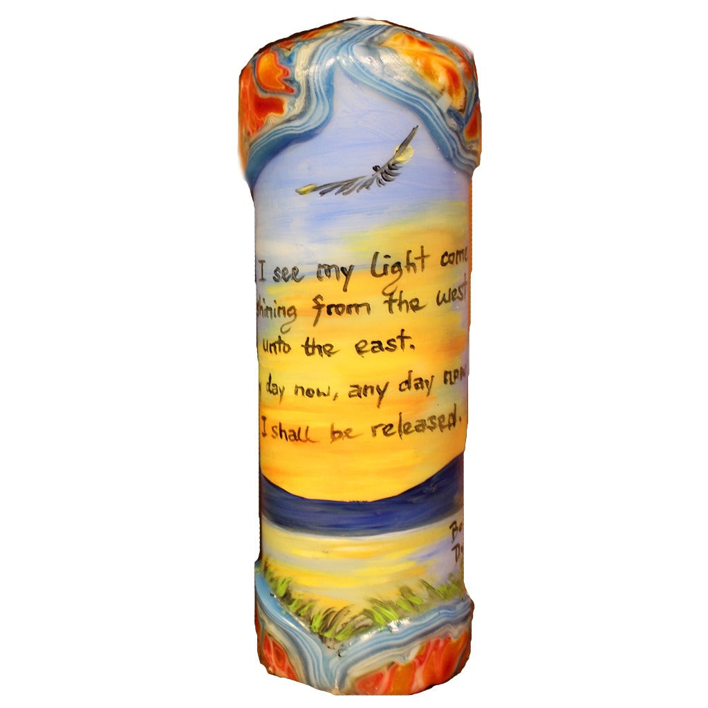 Quote Pillar Candle - "I see my light come shining from the west unto the east. Any day now, any day now I shall be released" Bob Dylan - Candlestock.com
